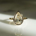 Bezel Set 3.04 CT Pear Cut Moissanite Engagement Ring