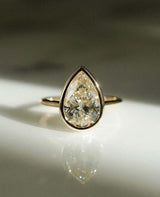 Bezel Set 3.04 CT Pear Cut Moissanite Engagement Ring