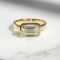 Bezel Set 2.85 Ct Emerald Cut Moissanite Engagement Ring