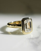 Bezel Set 2.24 Ct Emerald Cut Moissanite Engagement Ring